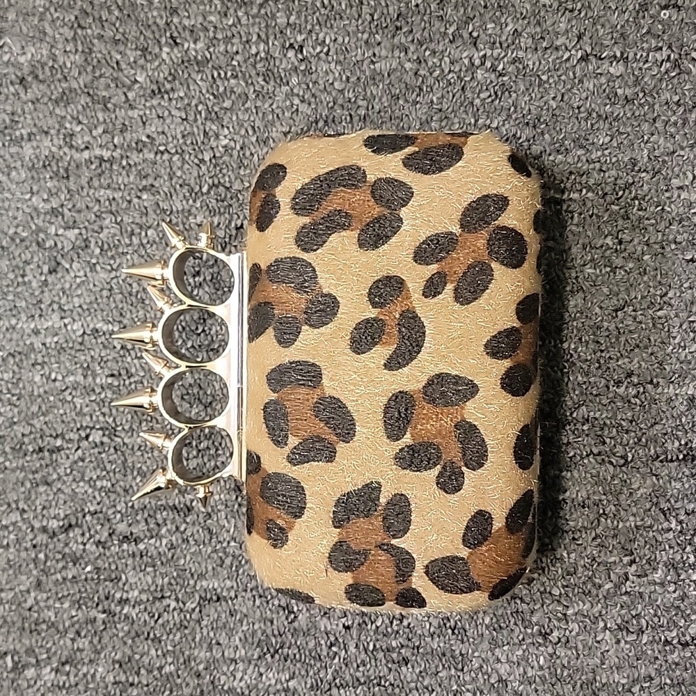 Animal print knuckle clutch